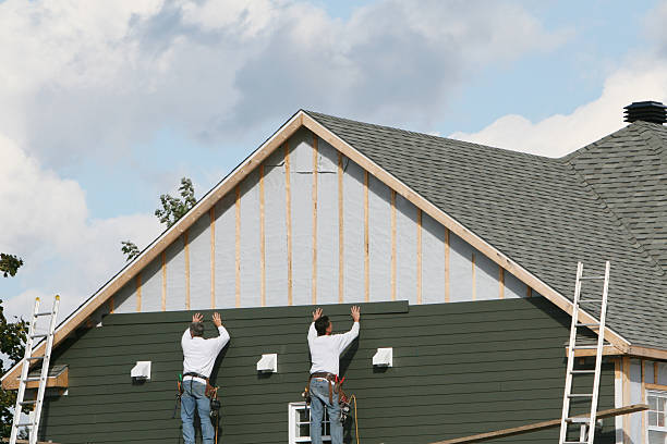 Professional Siding Contractor technician working in Gill, CO